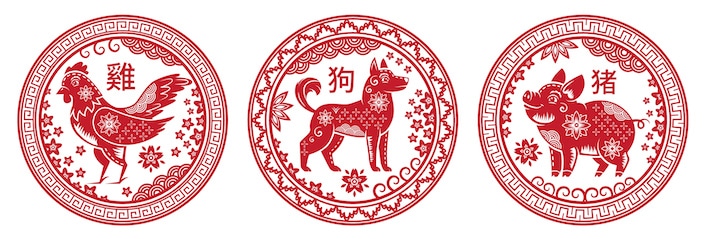 Round red pictures of Chinese zodiac animals (rooster, dog and pig)