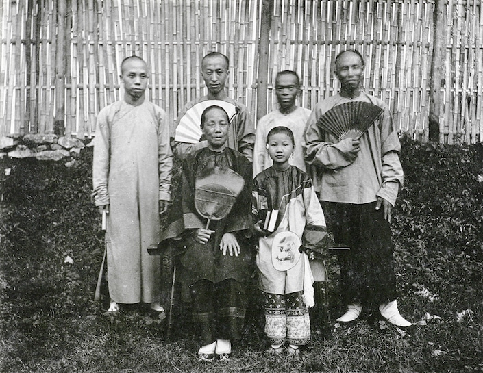 black and white historical photo of Guilin people in traditional dress