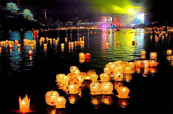 Chinese lanterns floating on a lake. 