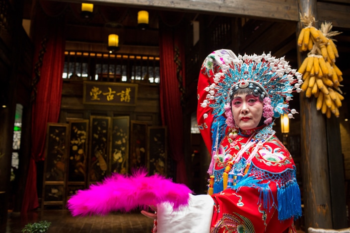 a traditional Chinese opera performer in costume