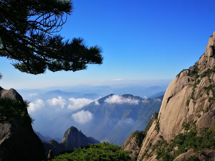 the view from the top of a mountain in Huangshan