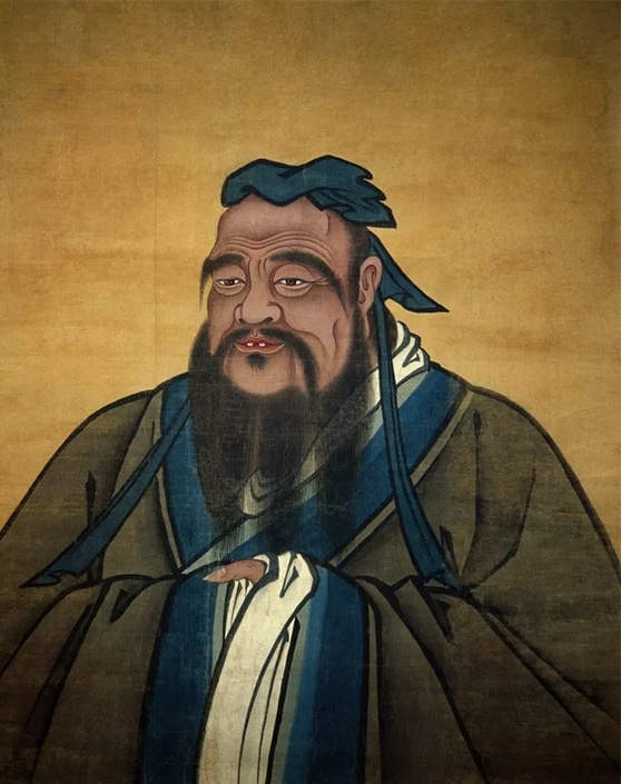 painting of Confucius with long beard and clasped hands