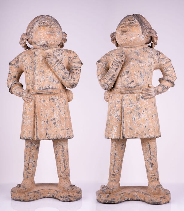 two Tang dynasty statues of foreigners
