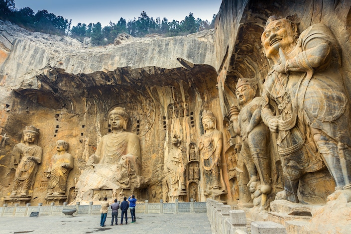 Buddhist statues at the Longmen Grottoes in China