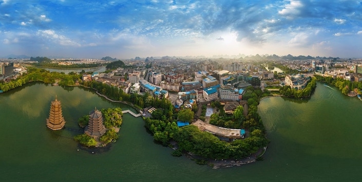 an aerial view of the Sun and Moon Pagodas in Guilin, China